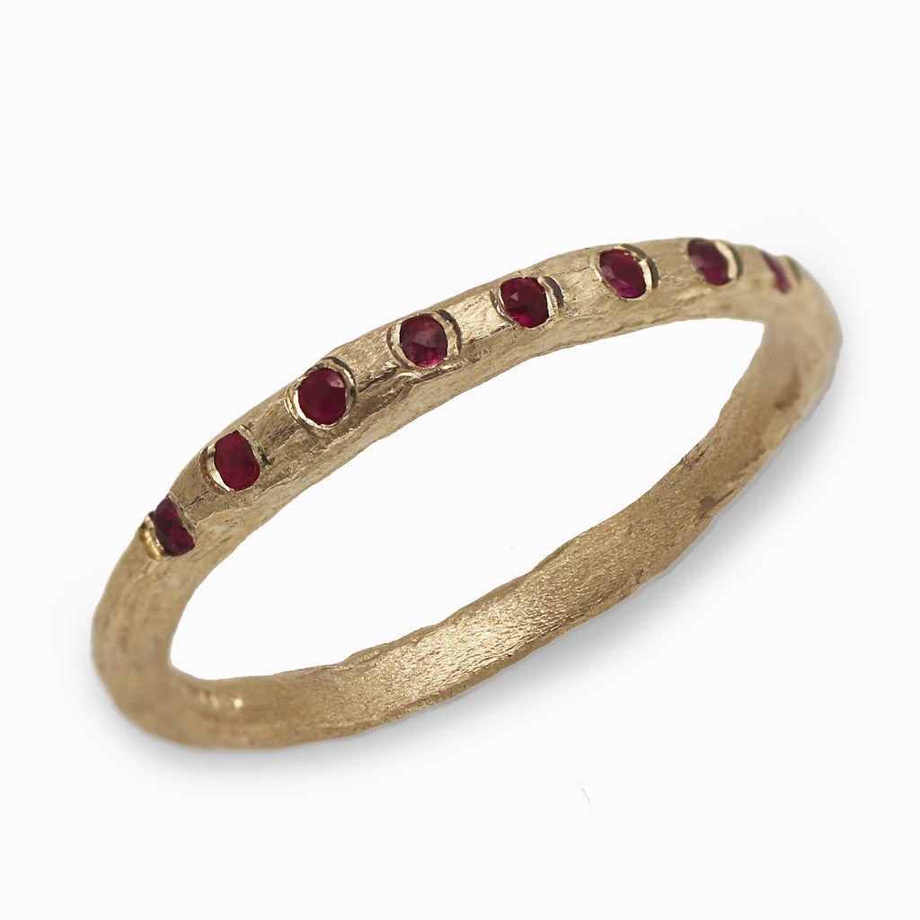 Textured Yellow Gold Eternity Ring With Rubies